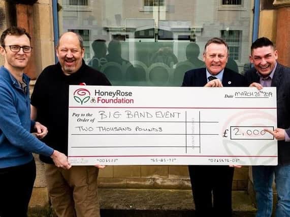 Gavin Roper (far right) with a cheque for 2,000 for the Honey Rose Foundation with (from left) Matt Evans from The Grand, Lee Roe from Ribble FM and Ron Hutchinson from the foundation.