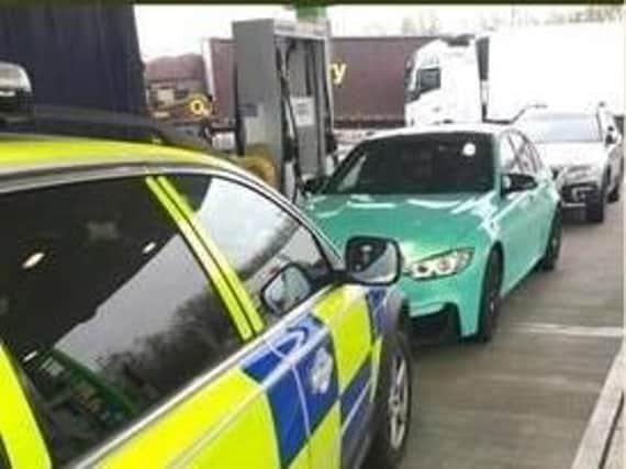 The moment police caught up with the stolen BMW car.