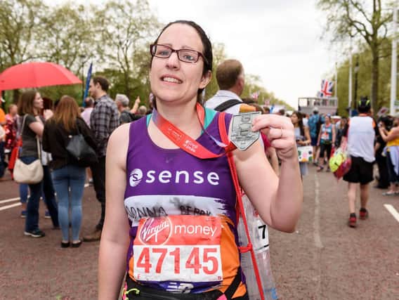 Donna Bibby with her medal from last year's London Marathon