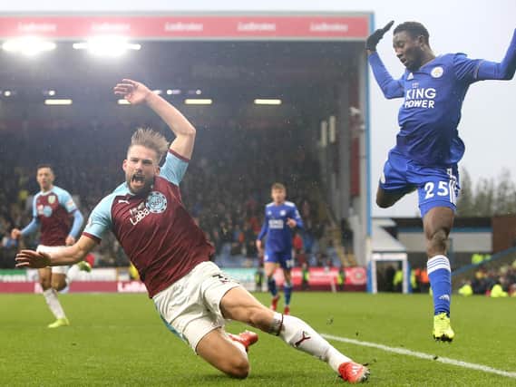 Charlie Taylor is brought down by Wilfred Ndidi against Leicester - but no penalty was given