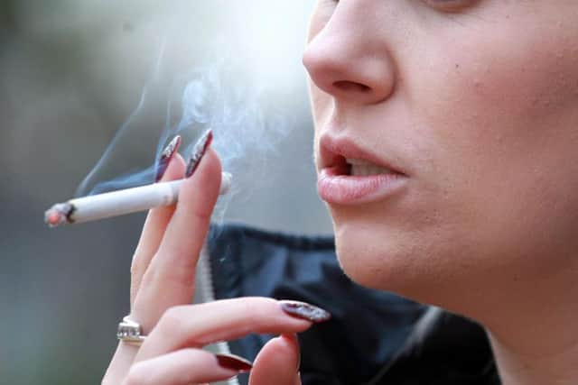 Funding for programmes to help people quit smoking have been slashed.
