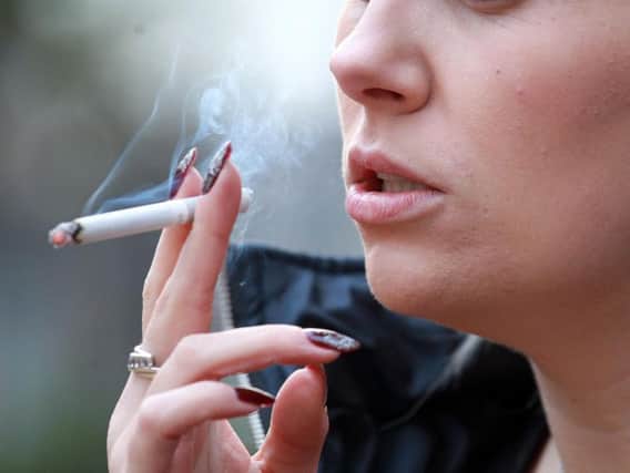 Funding for programmes to help people quit smoking have been slashed.