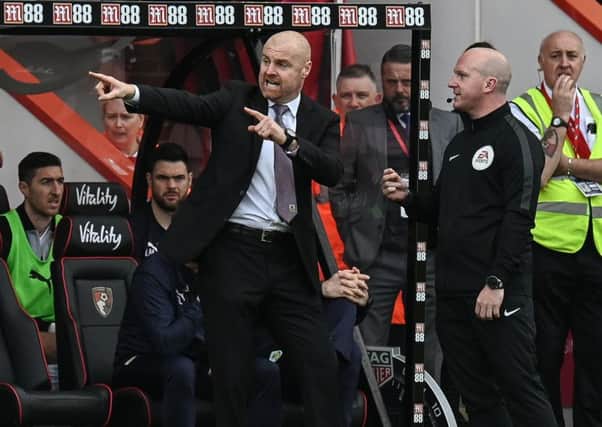 Burnley manager Sean Dyche (left) not happy and in discussion with the fourth official Simon Hooper after Burnley's Ashley Barnes was given a yellow cardPhotographer David Horton/CameraSportThe Premier League - Bournemouth v Burnley - Saturday 6th April 2019 - Vitality Stadium - BournemouthWorld Copyright © 2019 CameraSport. All rights reserved. 43 Linden Ave. Countesthorpe. Leicester. England. LE8 5PG - Tel: +44 (0) 116 277 4147 - admin@camerasport.com - www.camerasport.com