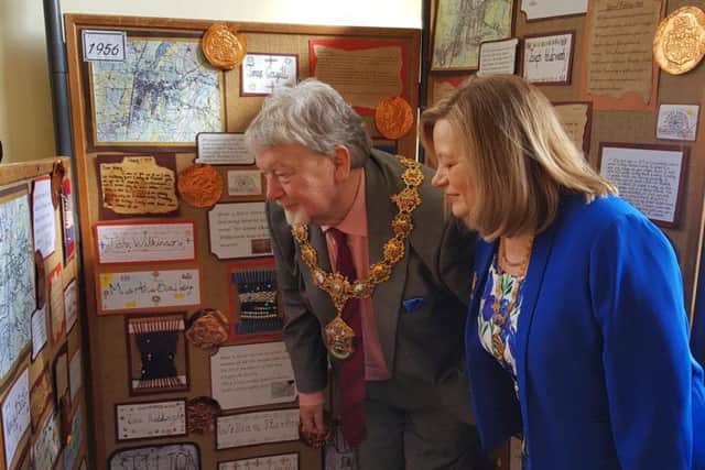 The Mayor and Mayoress of Pendle Coun. James Starkie and his wife Janet admire some of the work on display.