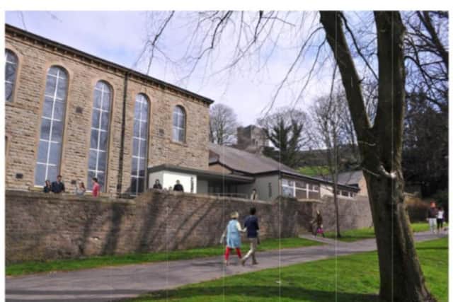 An artist impression showing the main church building connected to the church hall