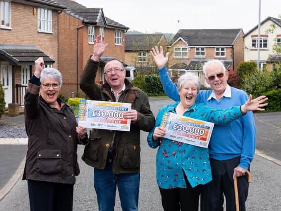 Judith Hodson, Sid Hodson, Patricia Knowles and Eric Knowles with their People's Postcode Lottery winnings
