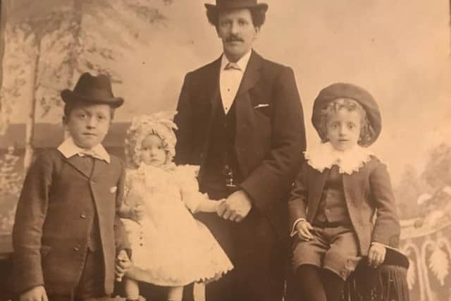 Allan Dent with his brothers Percy and Albert and their father Arthur in a photograph taken circa 1903