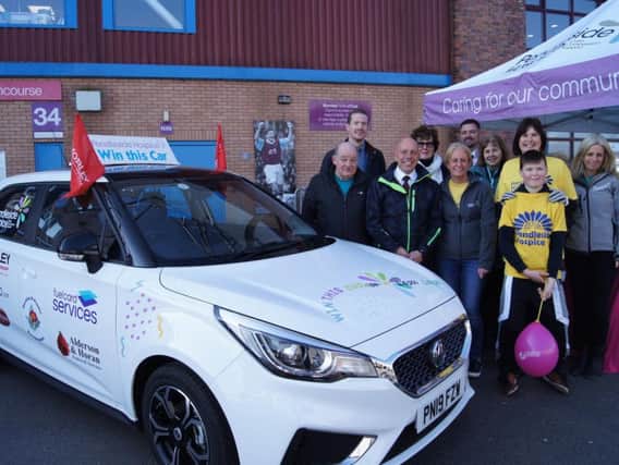 Helen McVey, Pendlesides chief executive (centre) at the launch of the hospices 2019 car raffle at Turf Moor.