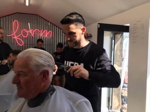 Craig Conway on top form as he auctions haircuts to boost funds for a worthwhile charity