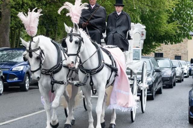 A white horse drawn carriage carried the coffin of Tia Taggart to her funeral in Padiham today.