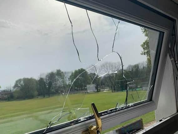 Vandals smash club window