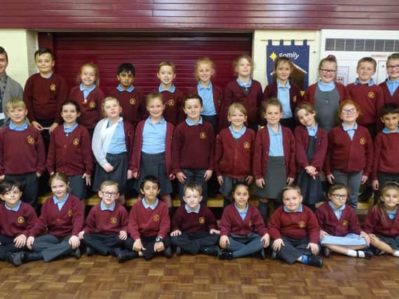 Class three at Holy Trinity Primary School in Burnley who have raised 853 for charity as part of a Lent project