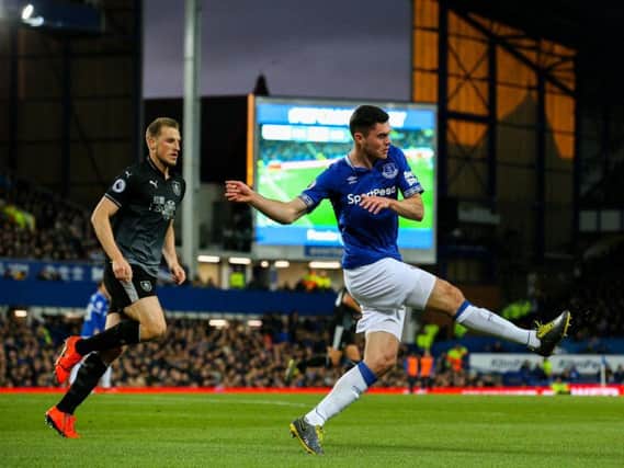 Everton's Michael Keane clears the ball