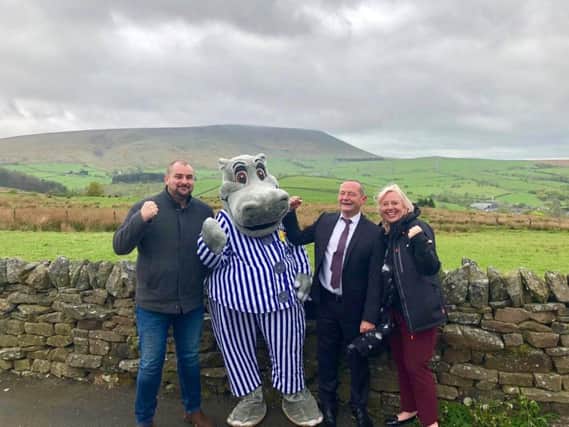 (Left to right)  SafeSpace project manager Ben Peverley, Silentnight Hippo, Ian Fortune, operations process improvement and industrial engineering manager at Silentnight and  Claire Bennet, charity manager for Positive Action in the Community