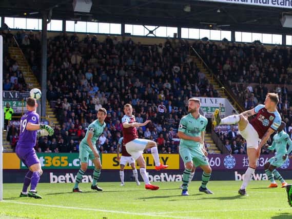 Burnley's Ashley Barnes scores against Arsenal on the final day of the Premier League season at Turf Moor