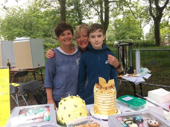 Ready to greet everyone on the cake stall are Lindsey Dyer (left) Mary Potter and Robbie Dixon.