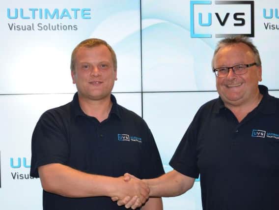 New UVS recruit, Pawel Religa, with the company's MD Steve Murphy.