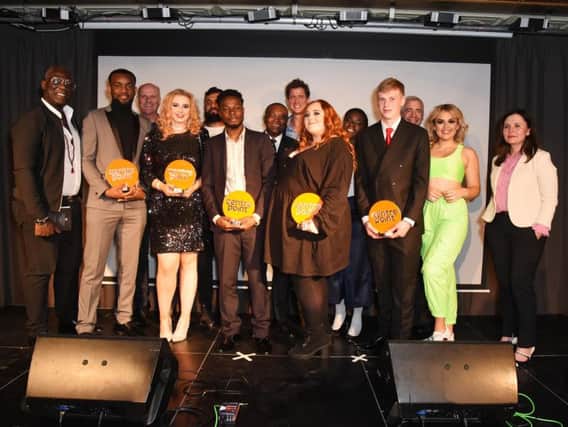 Sally (front row third from left) and Jade (fifth from left) pictured with celebrities and other award winners.