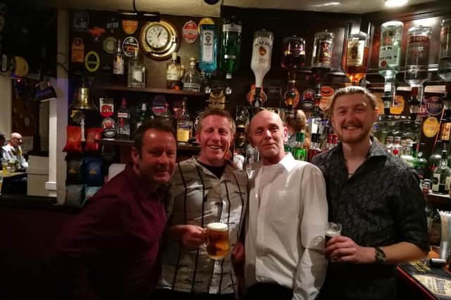 Mark Pomfret (second right),current landlord of The Lord Admiral Rodney, with his team. (s)