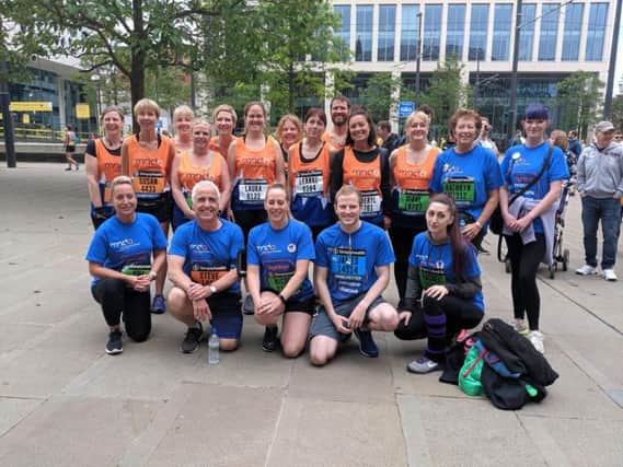 Friends and colleagues of Dani gather for a photocall before the start of the Manchester 10k which saw them raise 4,000 for charity in her memory.