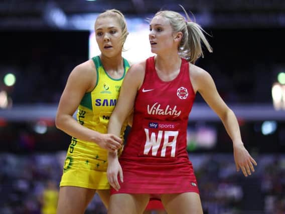 Kate Moloney of Australia in action against Natalie Haythornthwaite of England during the Vitality Netball International Series match between England Vitality Roses and Australian Diamonds, as part of the Netball Quad Series at Copper Box Arena