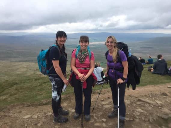 Teachers delighted having completed the Three Peaks Challenge