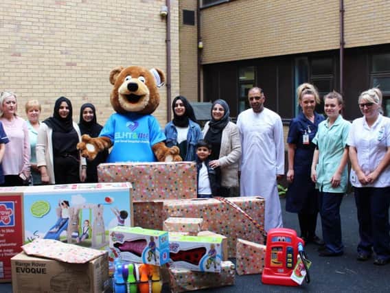 Staff with the donated toys