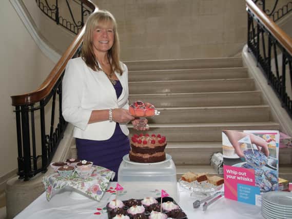 The Mayoress of Padiham Mrs Patricia Hudson is ready to sample some of the tempting treats on offer at the cupcake sale held at the town hall as part of Dementia Awareness week.