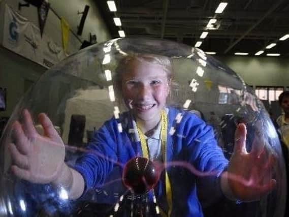 A youngster enjoys one of the many attractions at a previous science festival hosted by Burnley College.