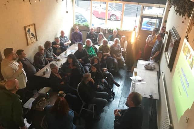 Residents gather to debate the issue of banning glyphosate from being used to kill weeds across areas of Burnley