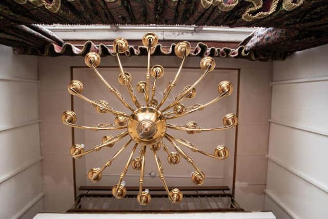 The ornate gold chandelier which hangs in the main stairwell of the former Keirby Hotel in Burnley.