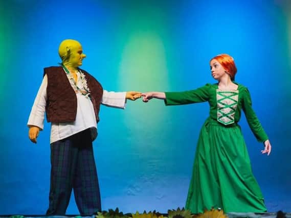 Levi Martin and Bella Withnell in Shrek the Musical Jr, presented by Pendle Hippodrome Youth Theatre. Photo credit: Sarah Redman Photography.