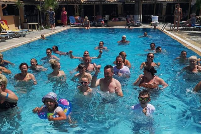 Some of the hotel guests who gathered in the pool for Viv's aerobics session.