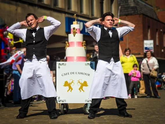 A feast of fun  The Comedy Waiters take to the streets during the Clitheroe Food Festival