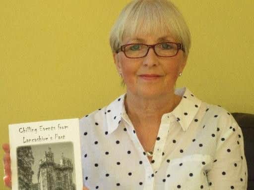 Author Julie Kayley with her second book Chilling Events from Lancashire's Past Julie will lead a guided walk around Burnley Cemetery this Sunday.