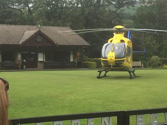 The air ambulance helicopter landing in Sabden yesterday