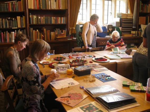 A craft afternoon at Gawthorpe Hall in full flow.