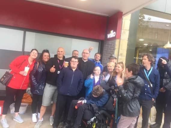 Pastor Mick Fleming (fifth from left) with staff and students from Ridgewood Community High School before they set out on their mission to feed the homeless on the streets of Burnley.