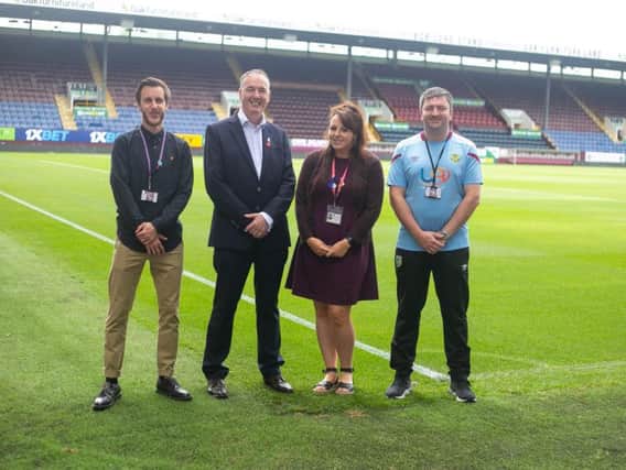 (From left) Michel Colquhoun, Head of Young Peoples Services at Burnley FC in the Community; Clive Grunshaw, Lancashire's Police and Crime Commissioner; Faye Speed, Partnerships and Training Coordinator at Lancashire Victim Services; and Ged Byrne, Youth Crime Reduction Officer at Burnley FC in the Community.