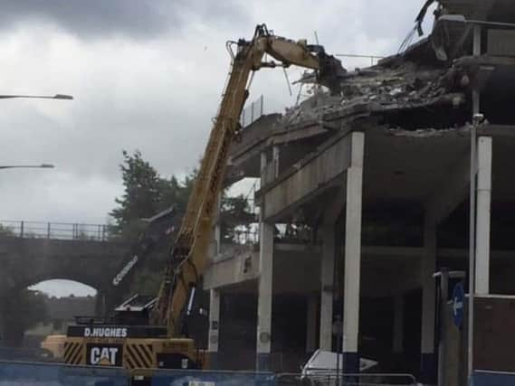 Work is ongoing to knock down the town's multi-storey car park
