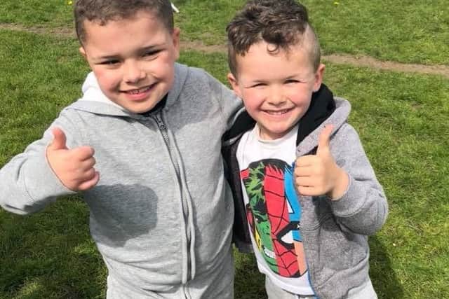 A thumbs up from Harley Lyth (left) and his little brother Harrison.