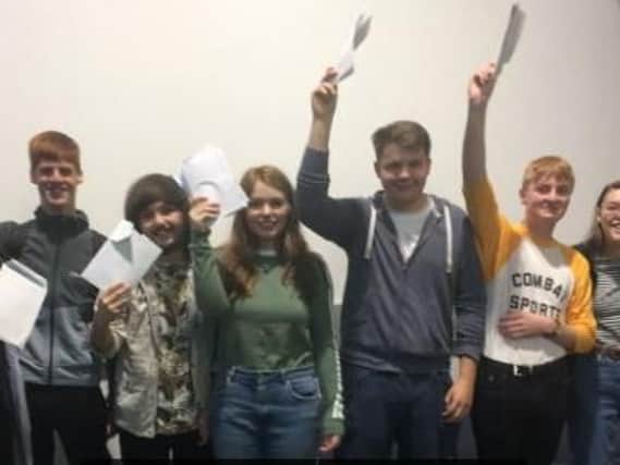 Happy with their results (from left to right) are Lucy Leyland, Tom Ashworth, Alex Pomeroy, Paige Kerry, Joe Drea, Oliver Hobbs, Erin Mason.