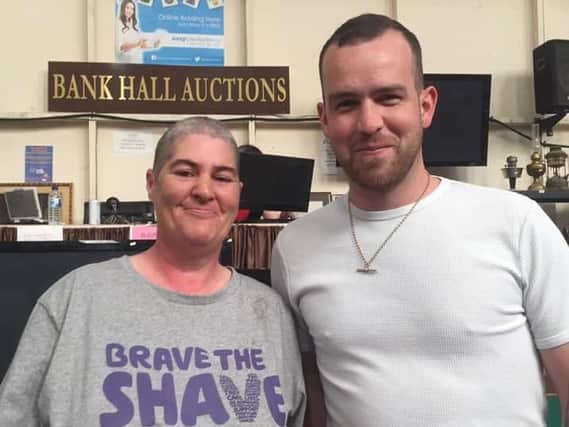 Karen Graham with Joe Wilkinson who helped her to Brave the Shave for Macmillan Cancer Support