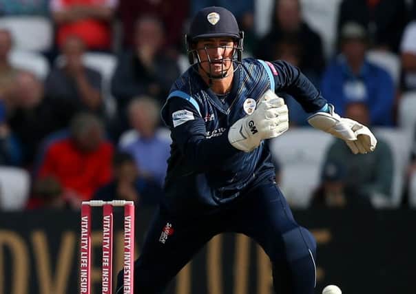 LEEDS, ENGLAND - AUGUST 11: Jack Leaning of Yorkshire Vikings bats with Daryn Smit of Derbyshire Falcons fielding during the Vitality Blast match between Yorkshire Vikings and Derbyshire Falcons at Emerald Headingley Stadium on August 11, 2019 in Leeds, England. (Photo by Jan Kruger/Getty Images)