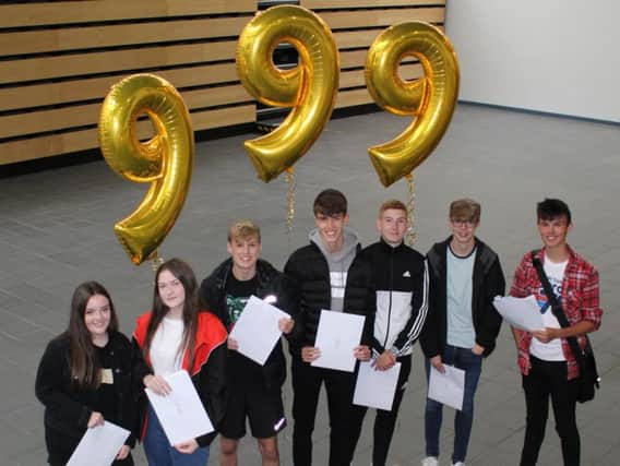 Celebrating exam success at Shuttleworth are  Ellie Green, Hannah Tomlinson, Harrison Whitehead, Luke Watmough, Joshua Huyton, Harry Guest and Josh Baker.