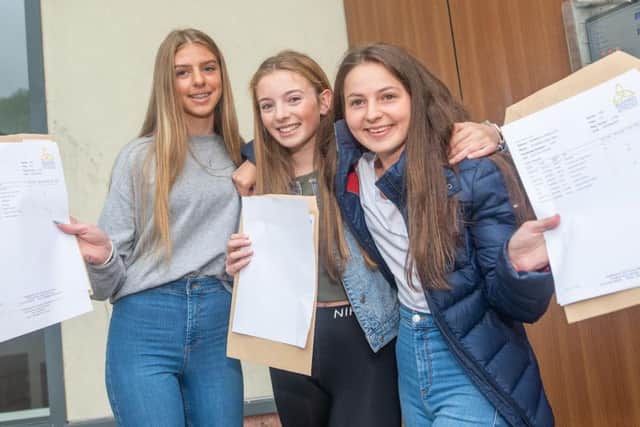 (Left to right) Rosie Railton, Francesca Dawes and Annabelle Uttley with their GCSE results