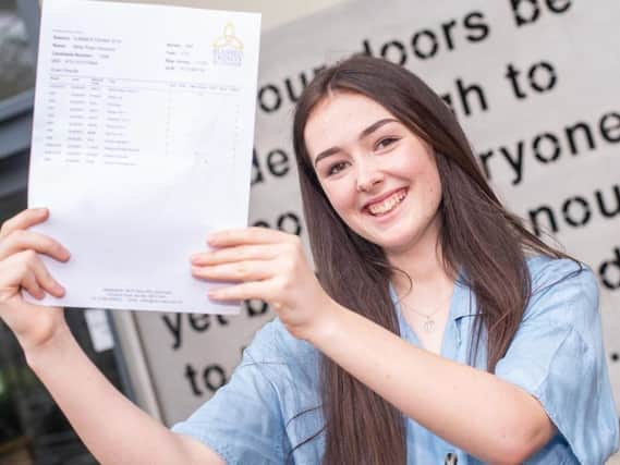 Molly Heywood with her fantastic GCSE results (photo Andy Ford)
