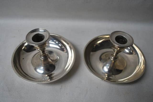 Rare pair of silver candle holders