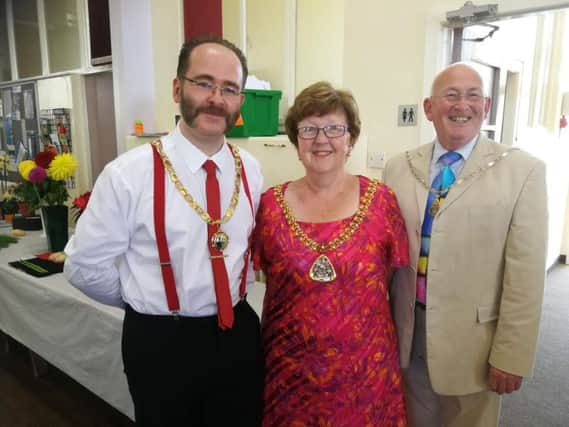 Chairman of Briercliffe Parish Council, Coun. Russell Hawkes with Mayor Coun. Anne Kelly and her consort, Mr John Kelly.