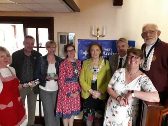 (From L-R) Sue Isherwood, Coun. Johnathan Hill and wife Gaynor, Clitheroe Mayoress Kerry Fletcher, Ribble Valley Mayor Stella Brunskill, Clitheroe Mayor Coun. Stewart Fletcher, Town Crier Roland Hailwood and manager Margot Moran